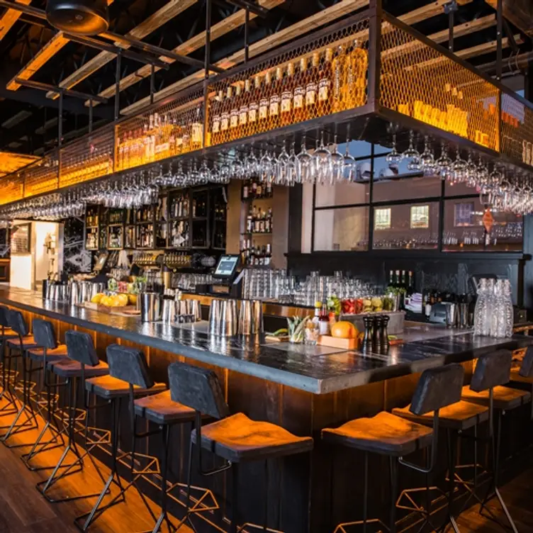 Rooftop patio bar at Kettner Exchange, perfect for networking and cocktail receptions.