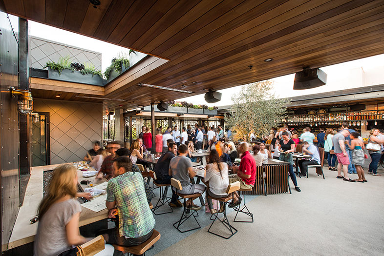 Rooftop patio at Kettner Exchange, vibrant venue for summer events and networking.