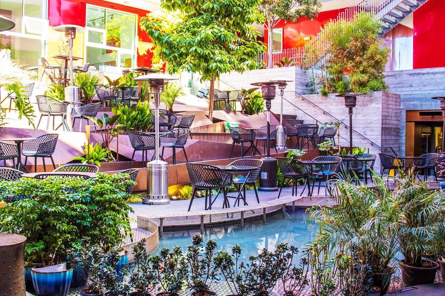 Vibrant outdoor lounge with tiered seating for networking events and casual gatherings.