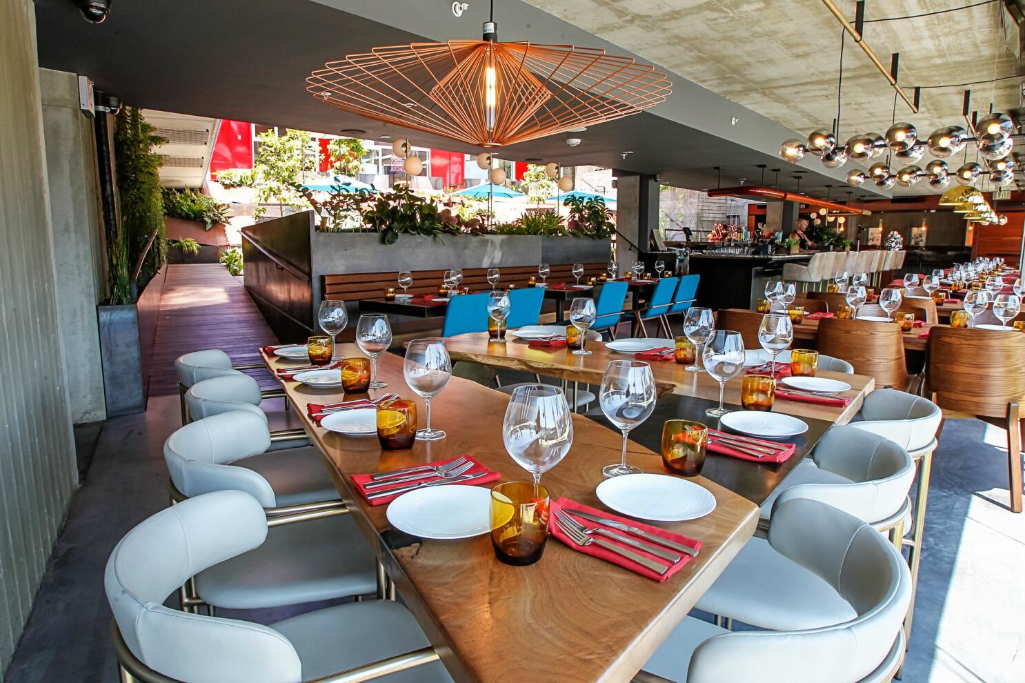 Stylish Main Dining Room at insideOUT, perfect for upscale events and networking dinners.