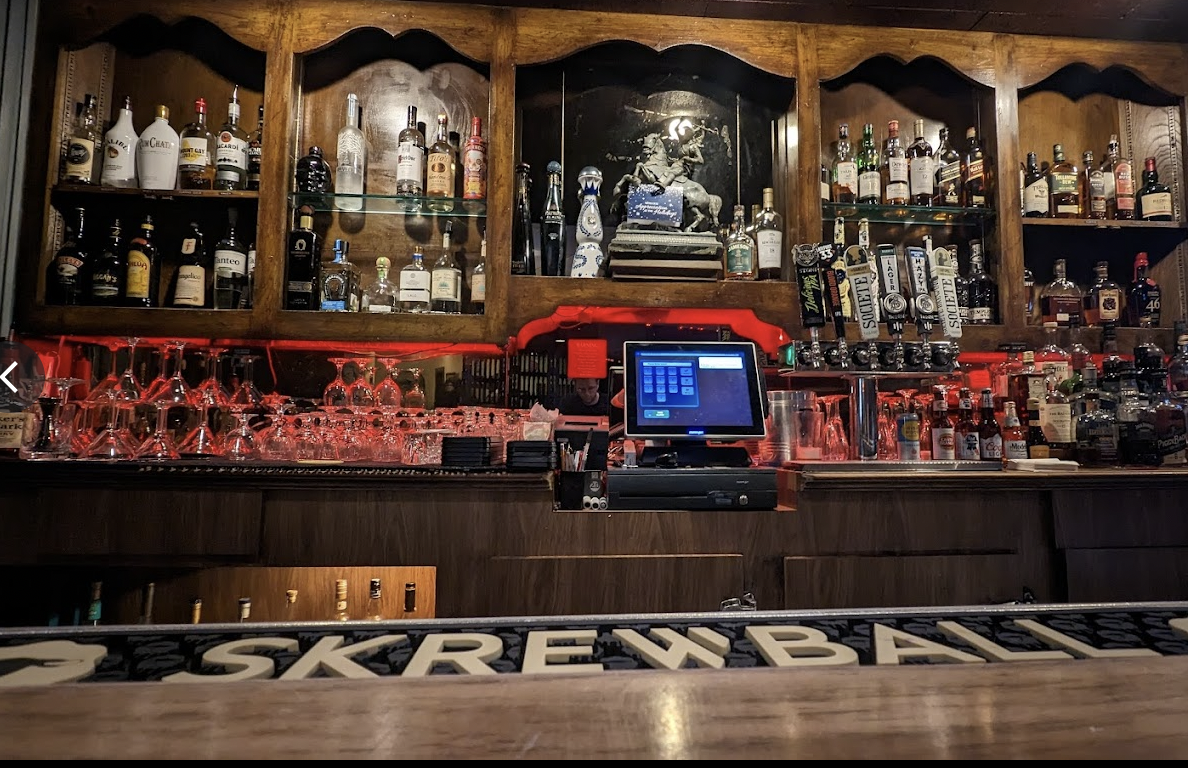 IMPY Bar & Grill: stylish bar setup ideal for cocktail receptions and networking events.