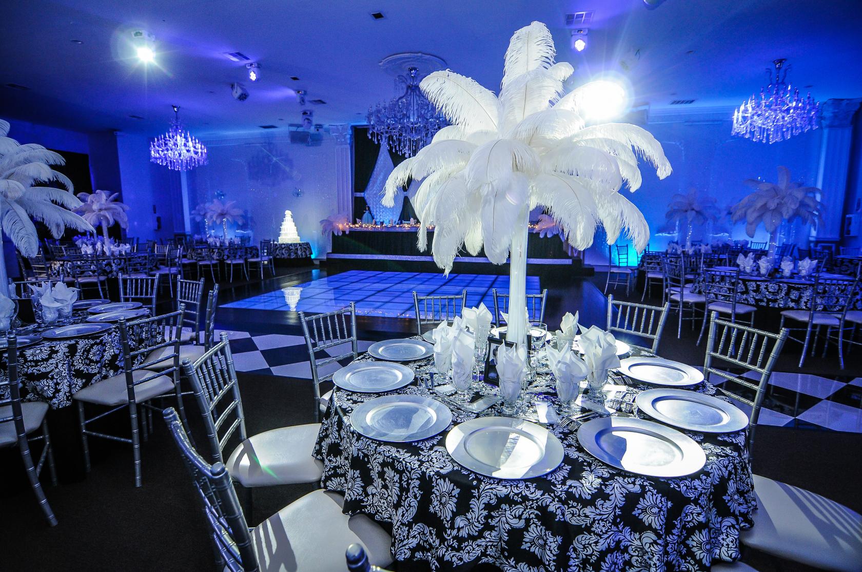 Elegant dance floor with floral centerpieces for upscale weddings and galas.