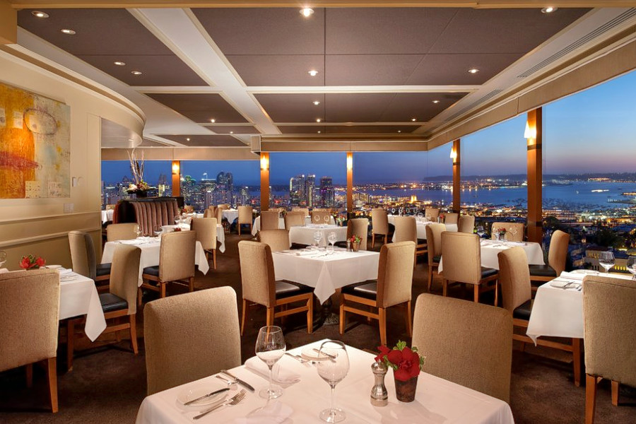 Elegant dining room at Mister A's Restaurant with city views, perfect for upscale events.