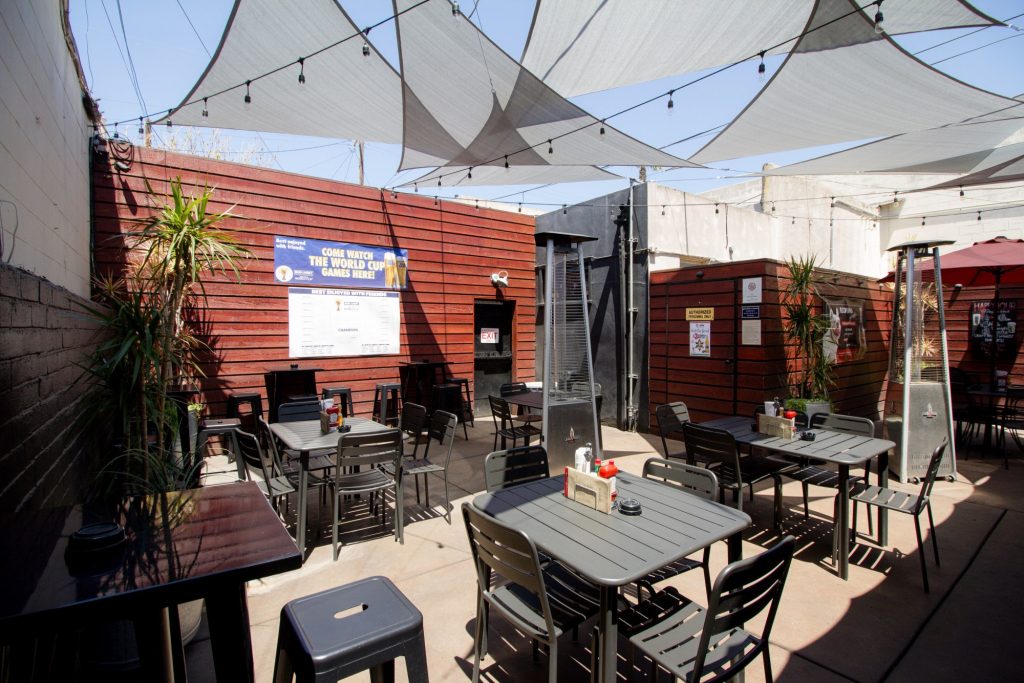 Indoor event space at Redwing Bar and Grill, modern seating for casual gatherings.