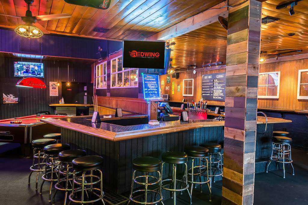 Cozy indoor bar at Redwing Bar and Grill, perfect for networking events and meetings.