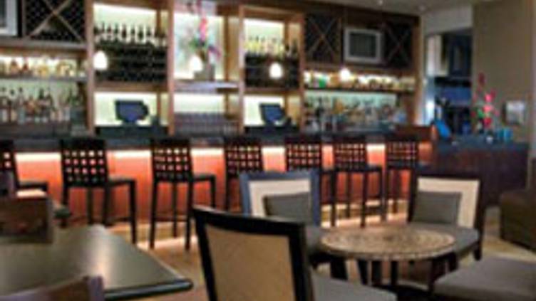 Stylish bar at Firefly Eatery, perfect for networking events and gatherings.
