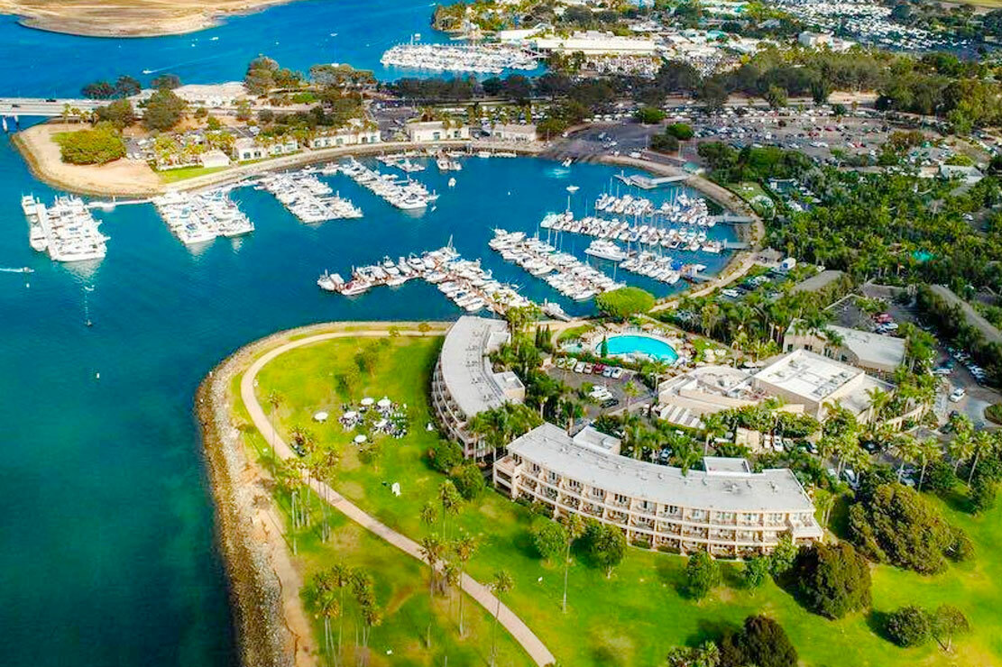 Tropical Courtyard at The Dana, waterfront venue for corporate events and retreats.