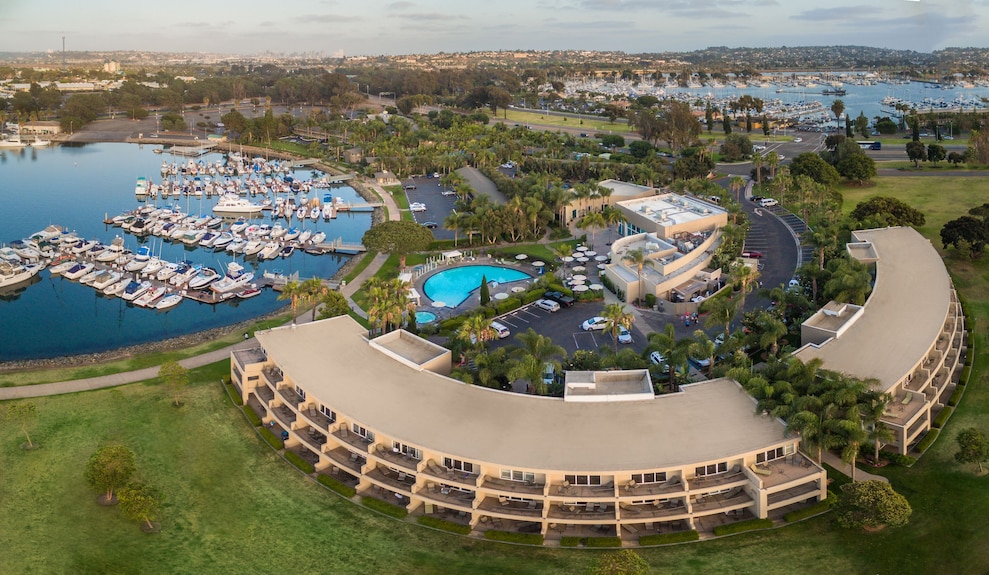 Tropical Courtyard at The Dana, waterfront venue for events with lush landscaping and pool.