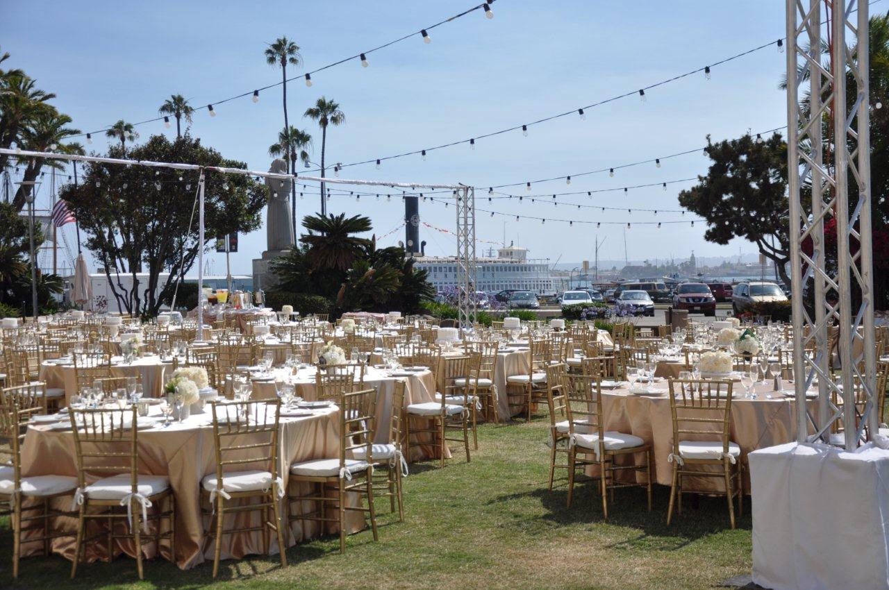 Elegant outdoor event space in San Diego with floral centerpieces, ideal for weddings.