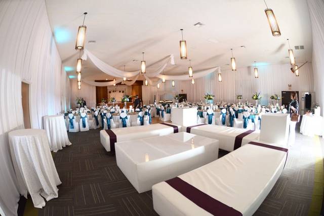 Elegant ballroom with blue accents, perfect for weddings and formal events.