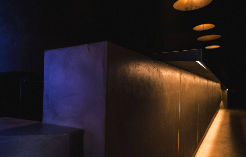 Sleek modern bar at Discotech, ideal for networking events and cocktail receptions.