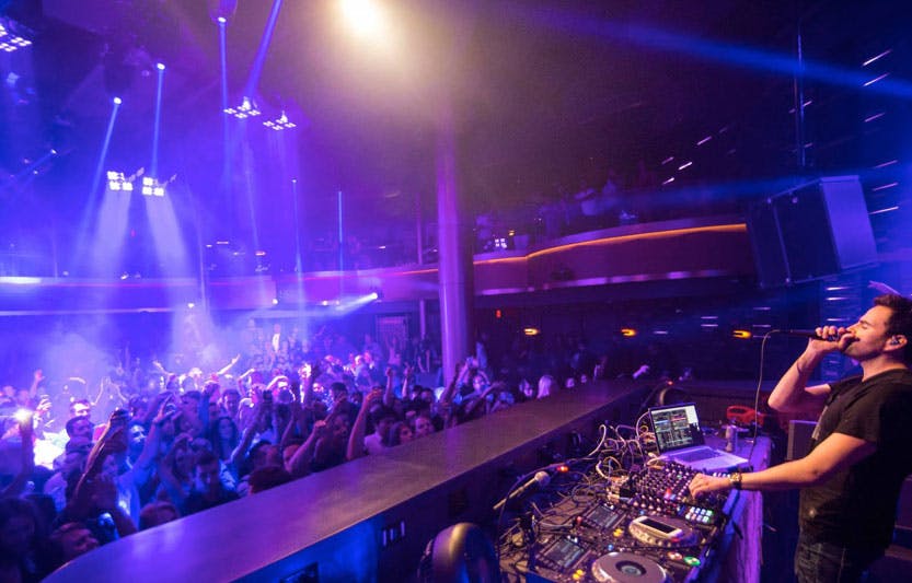 DJ performing at Boardners nightclub during a vibrant nightlife event.