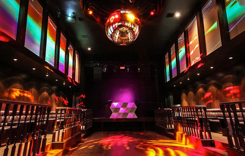 Vibrant Boardners event space with disco ball, ideal for parties and corporate events.