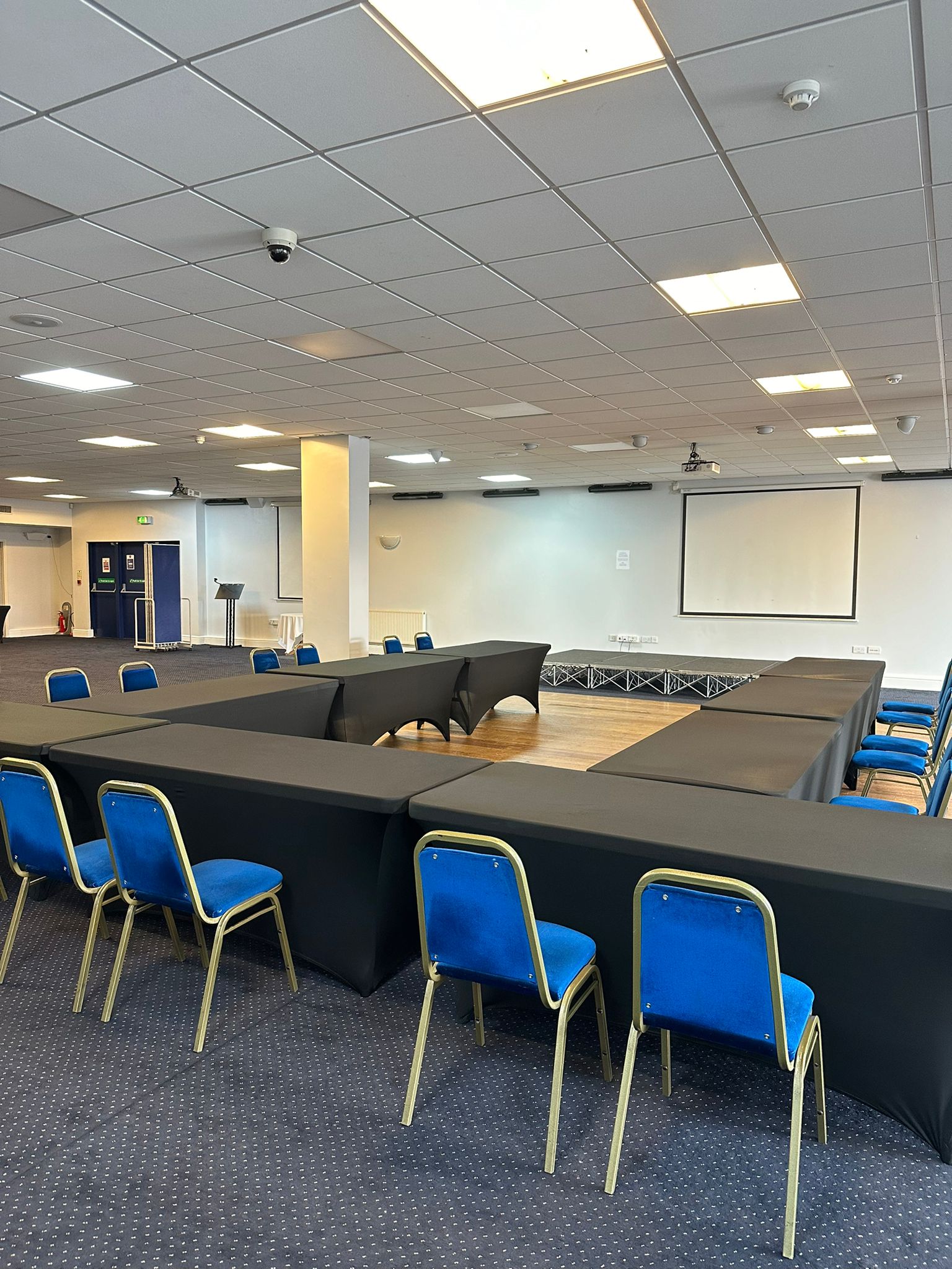 Saffron Suite conference room with U-shaped table layout for workshops and meetings.