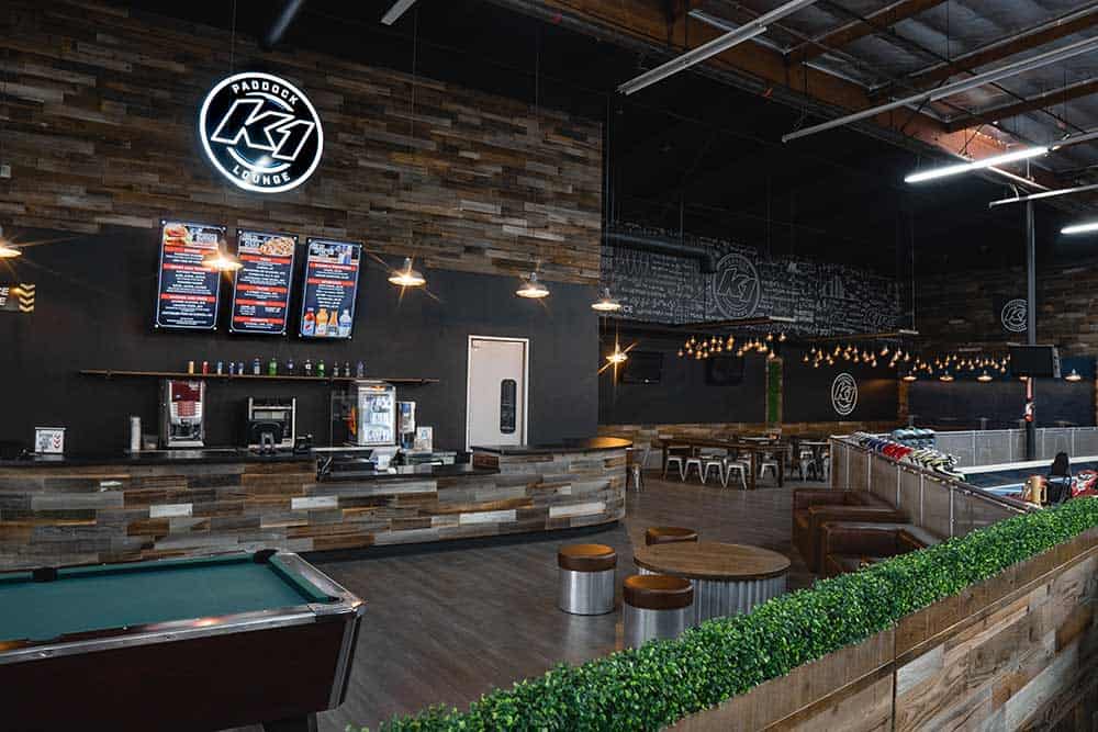 Modern Paddock Lounge with rustic wood accents, ideal for events and gatherings.