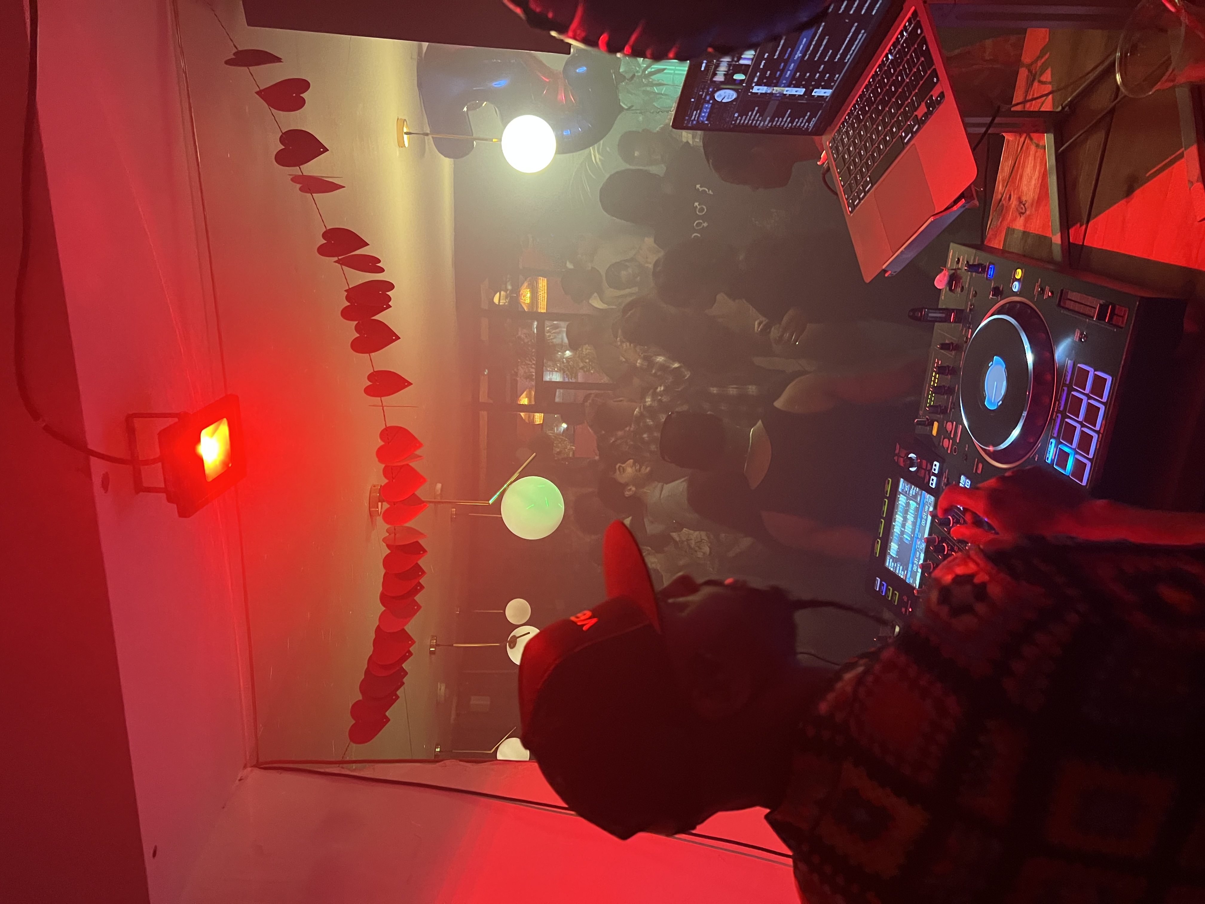 Mosaic Clapton Wine Bar DJ event with vibrant atmosphere and intimate lighting.