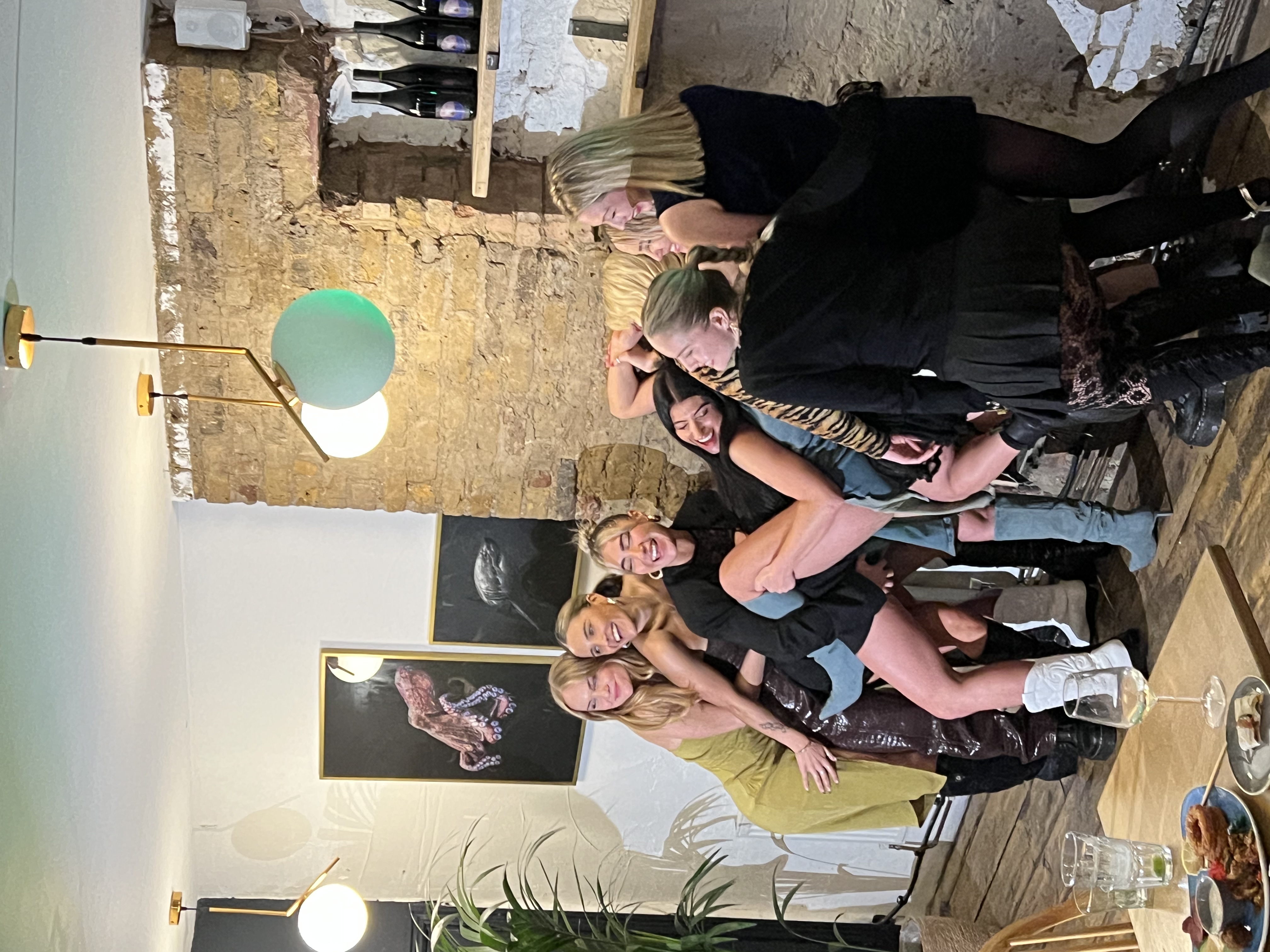 Vibrant women enjoying a lively event at Mosaic Clapton Wine Bar, perfect for celebrations.
