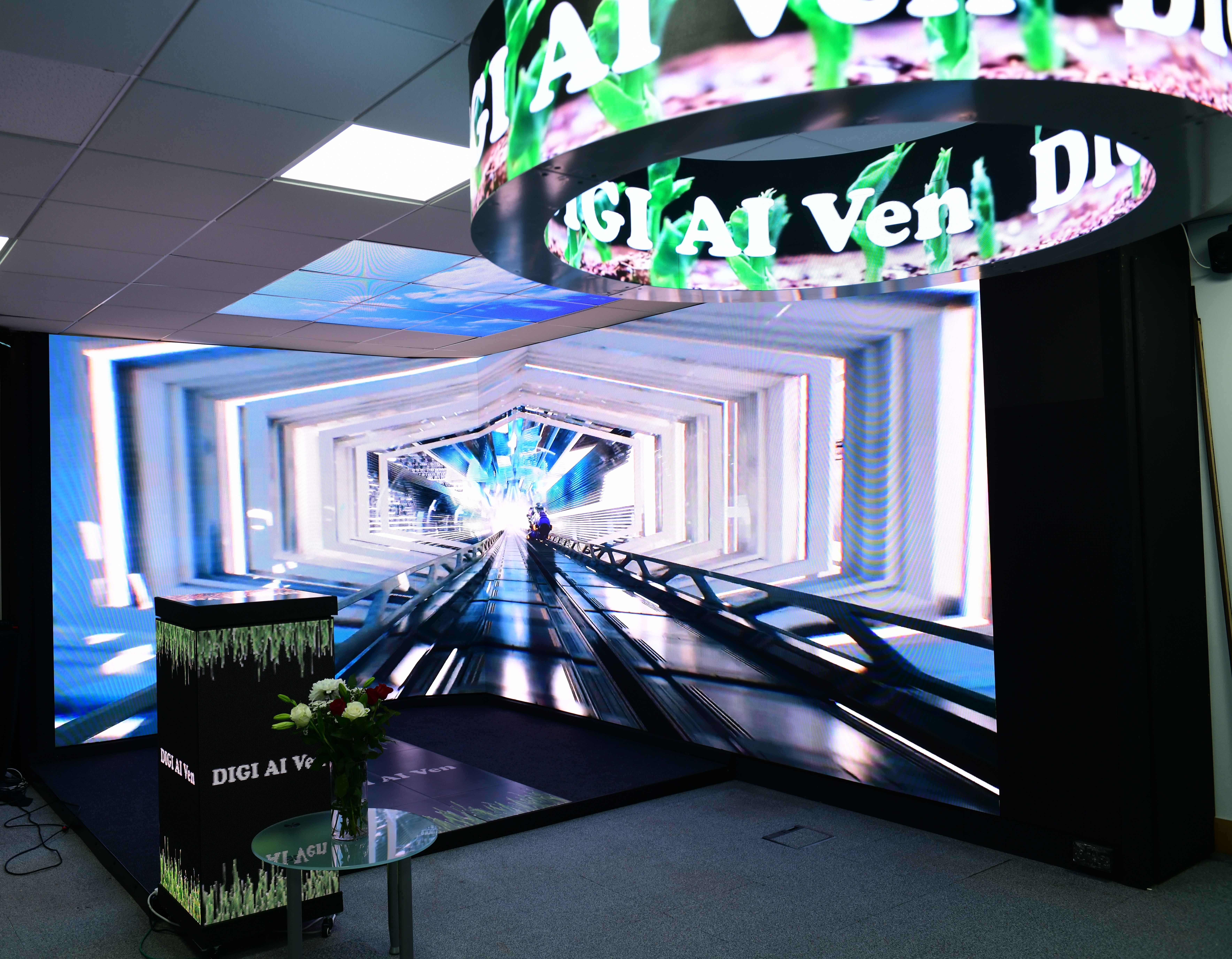 Futuristic conference room with immersive digital display for tech events and exhibitions.