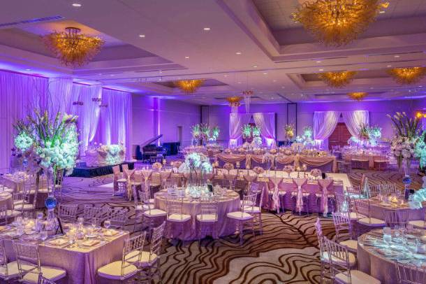 Elegant event space with floral centerpieces for weddings and galas at Americas Best Value Inn.