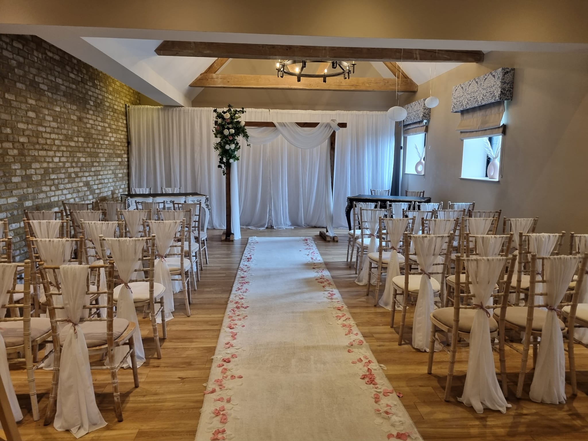 Cedar Suite at Voco Lythe Hill Hotel, elegant wedding venue with chiavari chairs.
