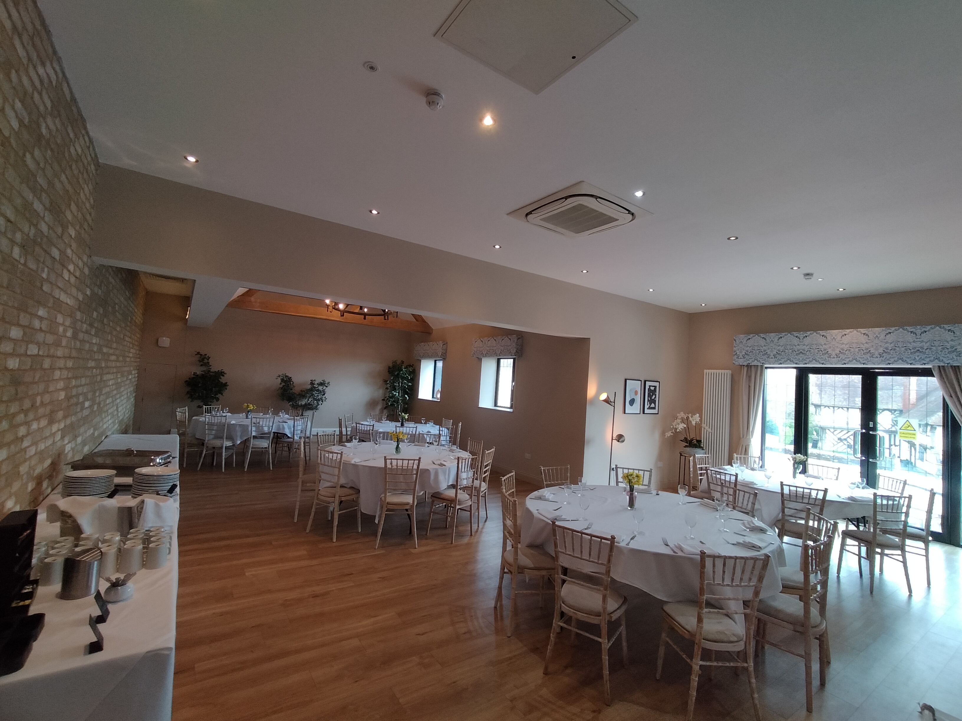 Cedar Suite at Voco Lythe Hill: elegant event space for banquets and meetings.