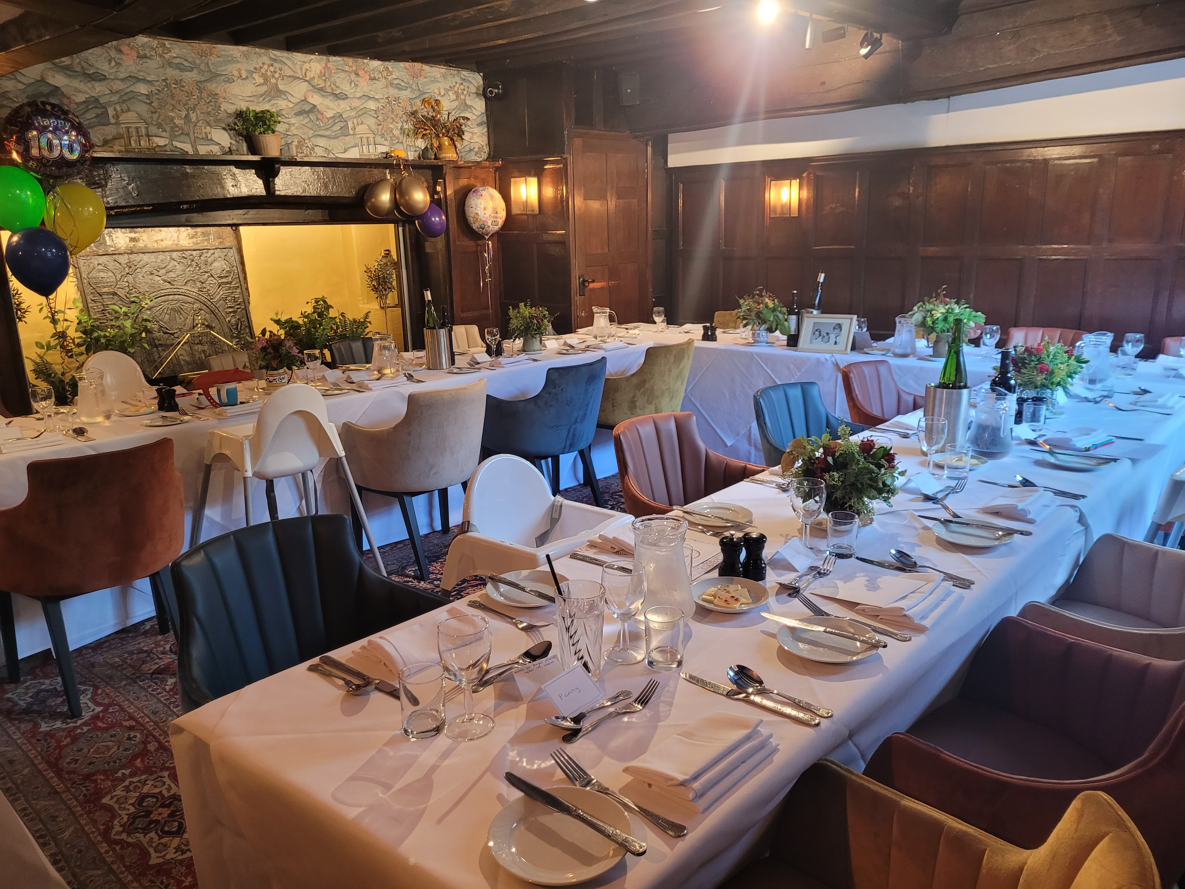 Elegant dining setup in The Oak Room, Voco Lythe Hill Hotel for intimate celebrations.