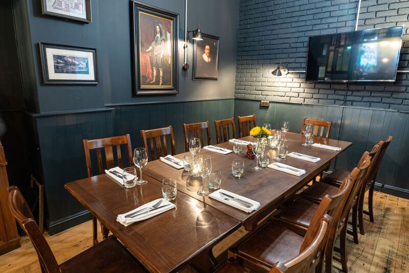 Private dining room at The Tokenhouse with elegant table setting for events and meetings.