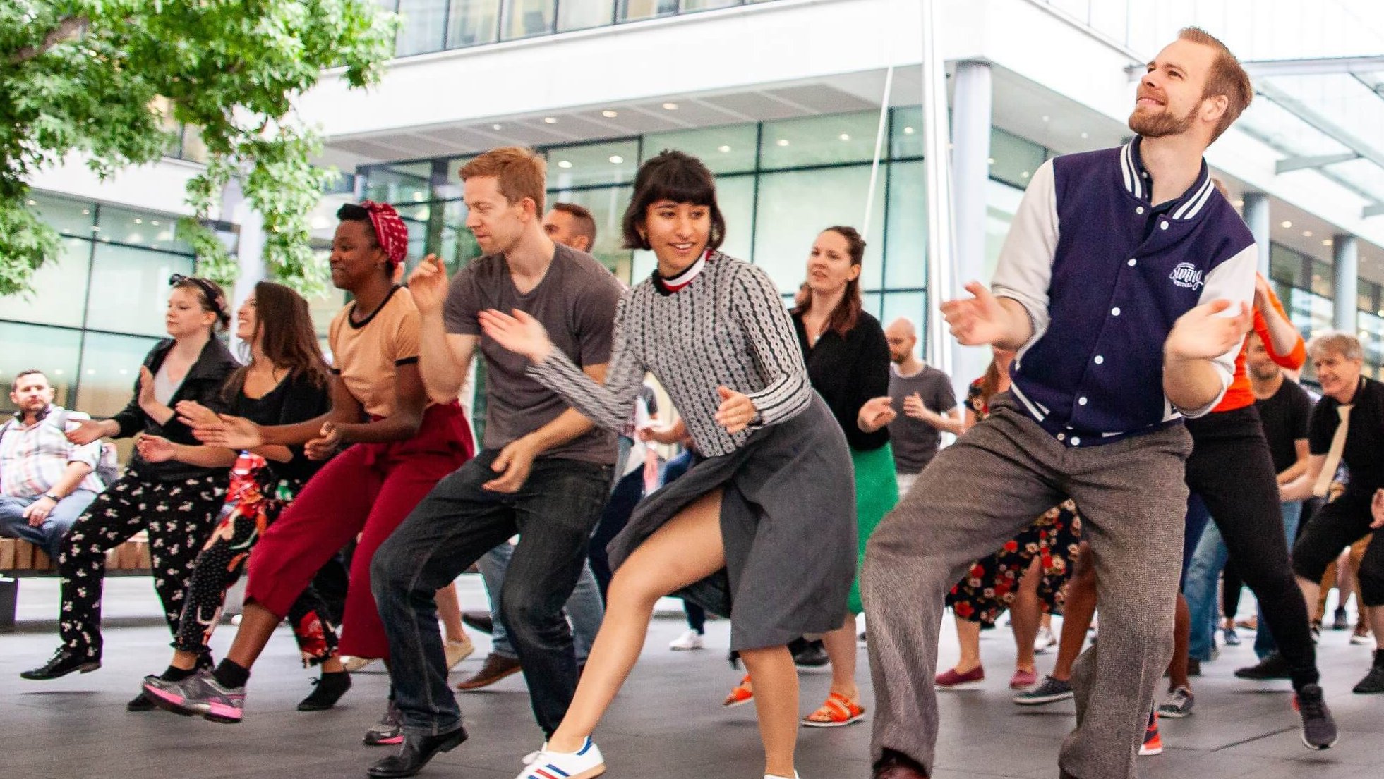 Vibrant dance class at Swing Patrol, showcasing inclusivity and engagement for events.