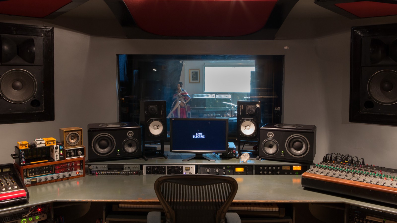 Professional recording studio with high-quality sound equipment for creative workshops.