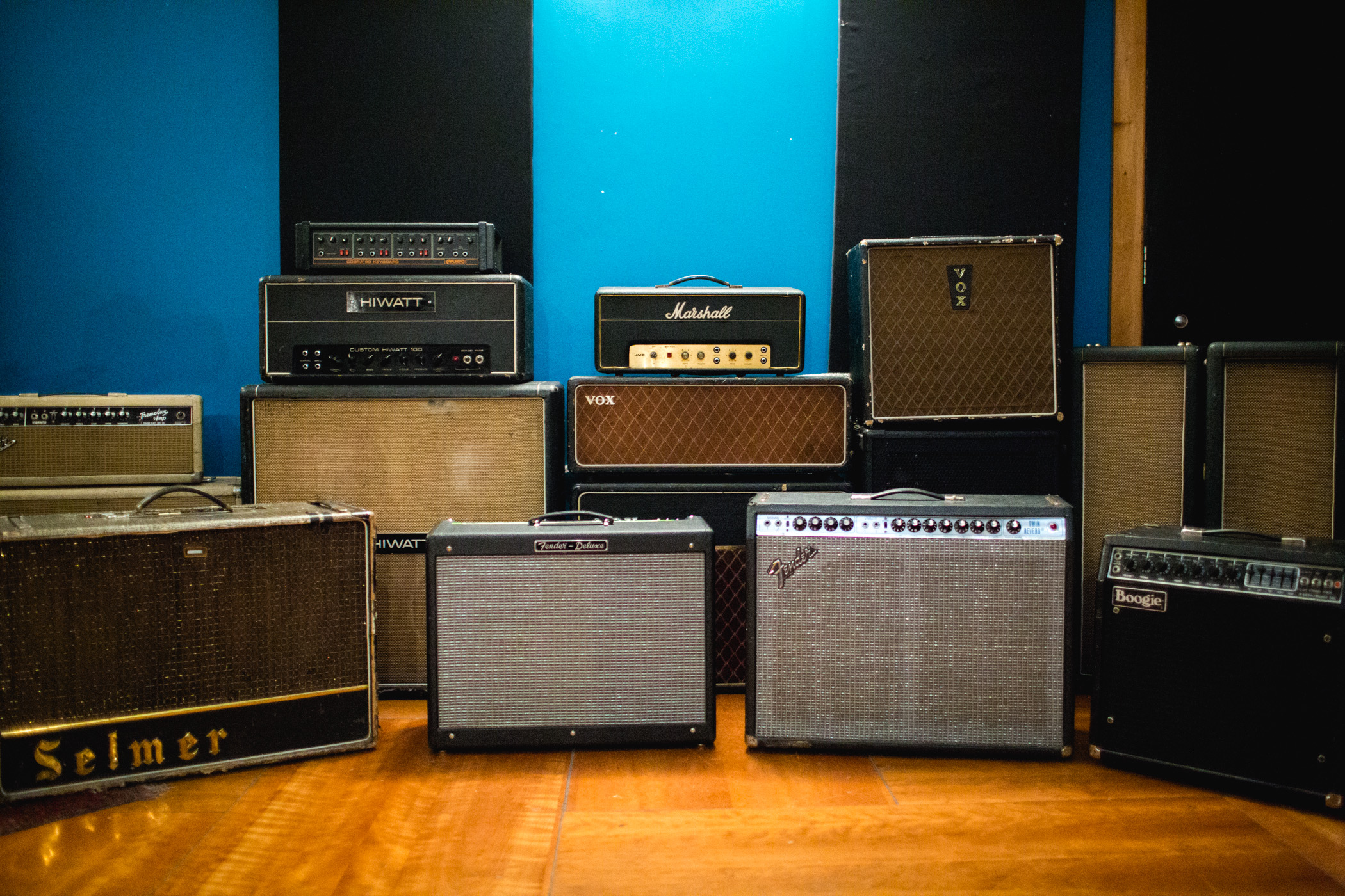Vintage guitar amplifiers in Love Electric recording studio for quality sound events.