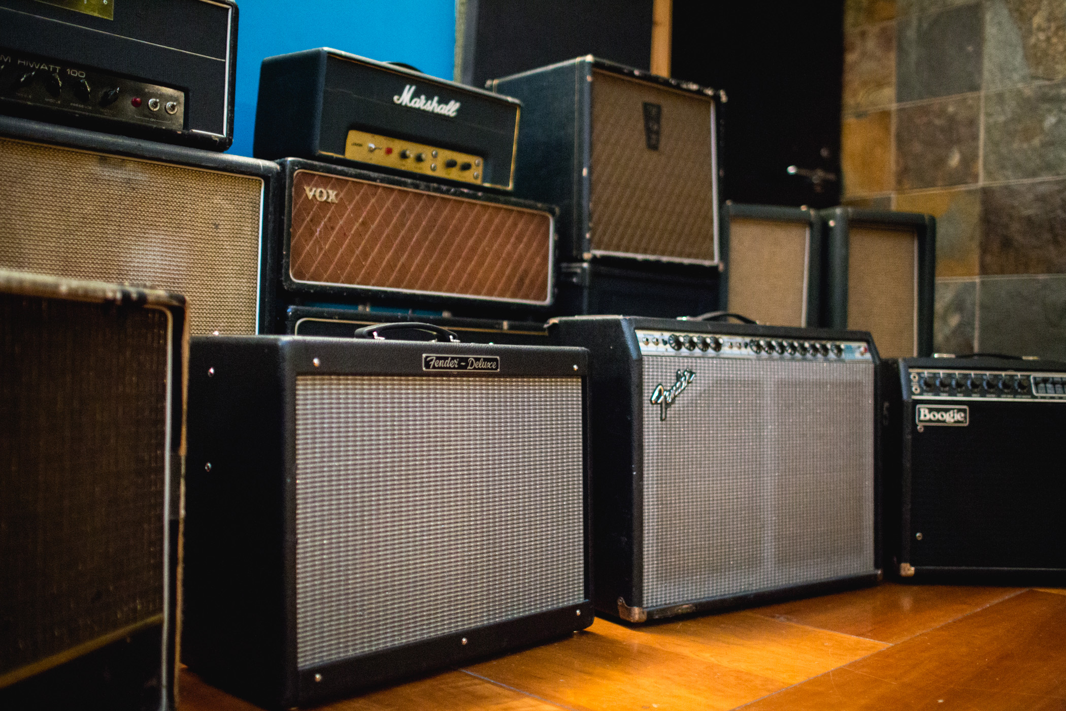 Vintage amplifiers in Love Electric recording studio for live music events.