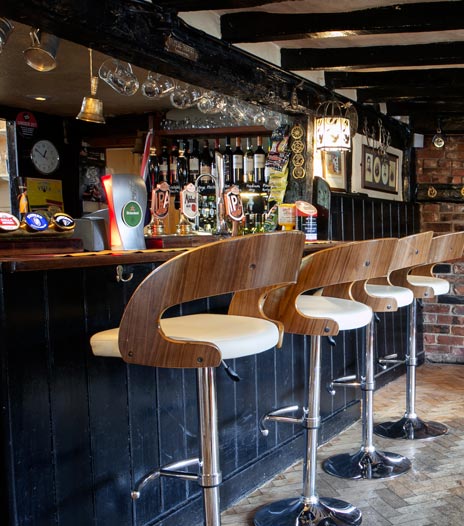 Stylish bar at The Hatch Club, perfect for networking events and casual gatherings.