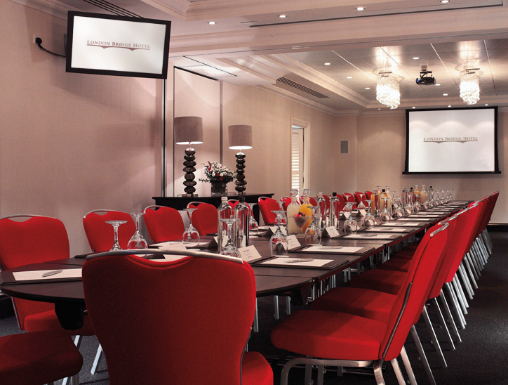 Shakespeare Suite II meeting room with red chairs, ideal for corporate events and workshops.