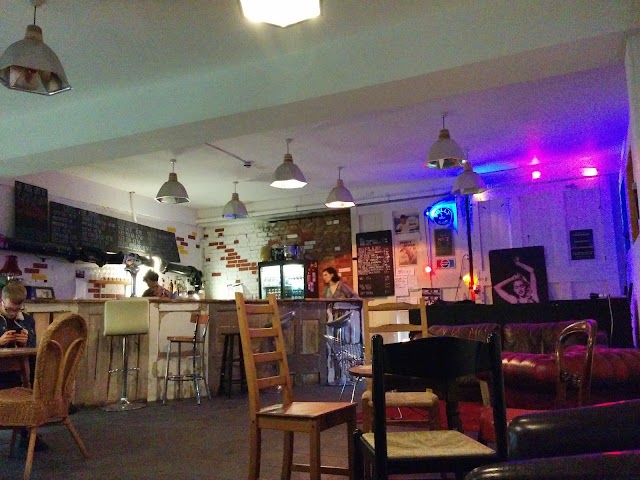 Recording studio event space with eclectic seating, ideal for casual gatherings and meetings.