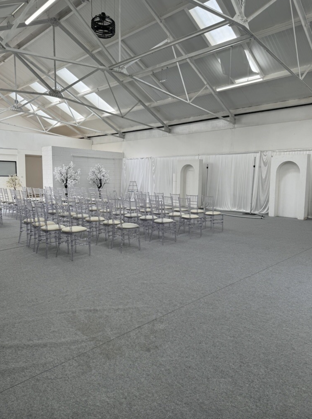 Elegant event space with chiavari chairs, perfect for weddings or corporate gatherings.
