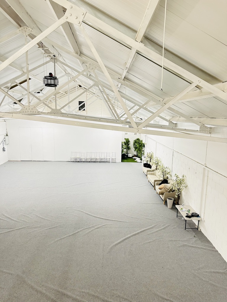 Spacious Sweet Space venue with high ceiling, ideal for events and gatherings.