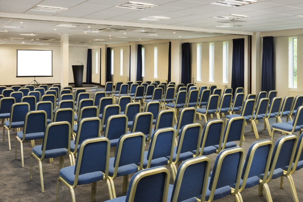 St David's Suite at Mercure Cardiff North Hotel, ideal for seminars with blue chairs.