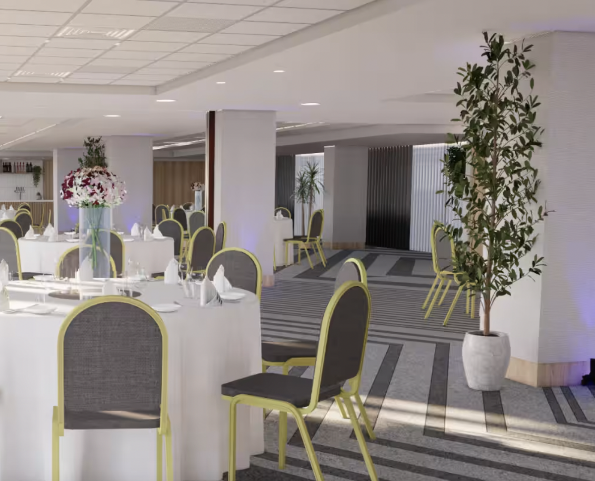 Modern Piccadilly Suite at Manchester Marriott for versatile events, featuring elegant round tables.
