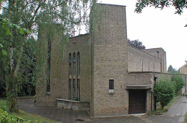 St John Fisher Church Hall, modern venue with brick exterior for creative events.