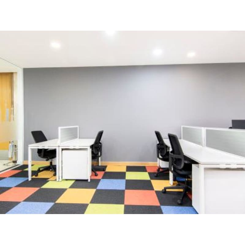 Modern meeting room with ergonomic chairs in Canary Wharf, ideal for workshops and collaboration.