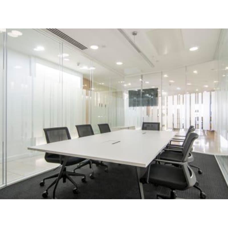 Modern conference room with glass walls at Signature by Regus, Canary Wharf.