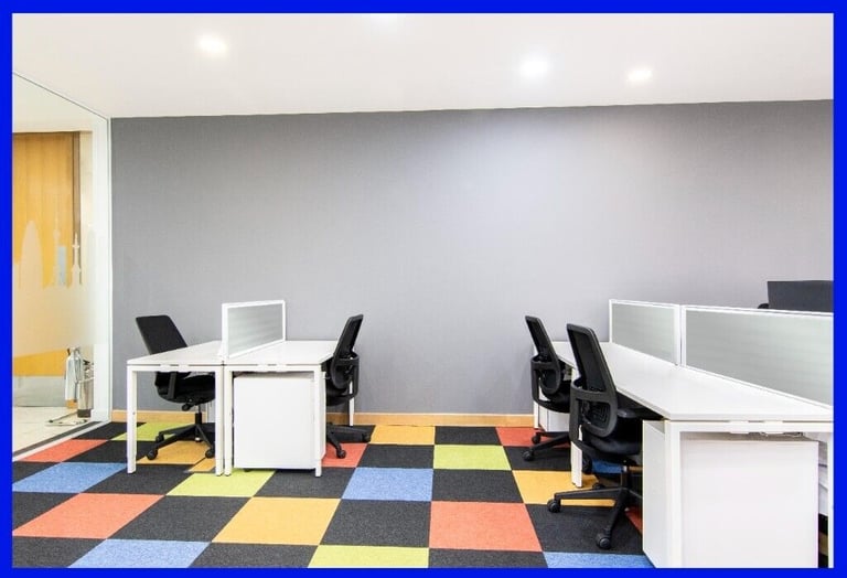 Modern virtual office space with colorful carpet tiles for collaborative meetings in London.