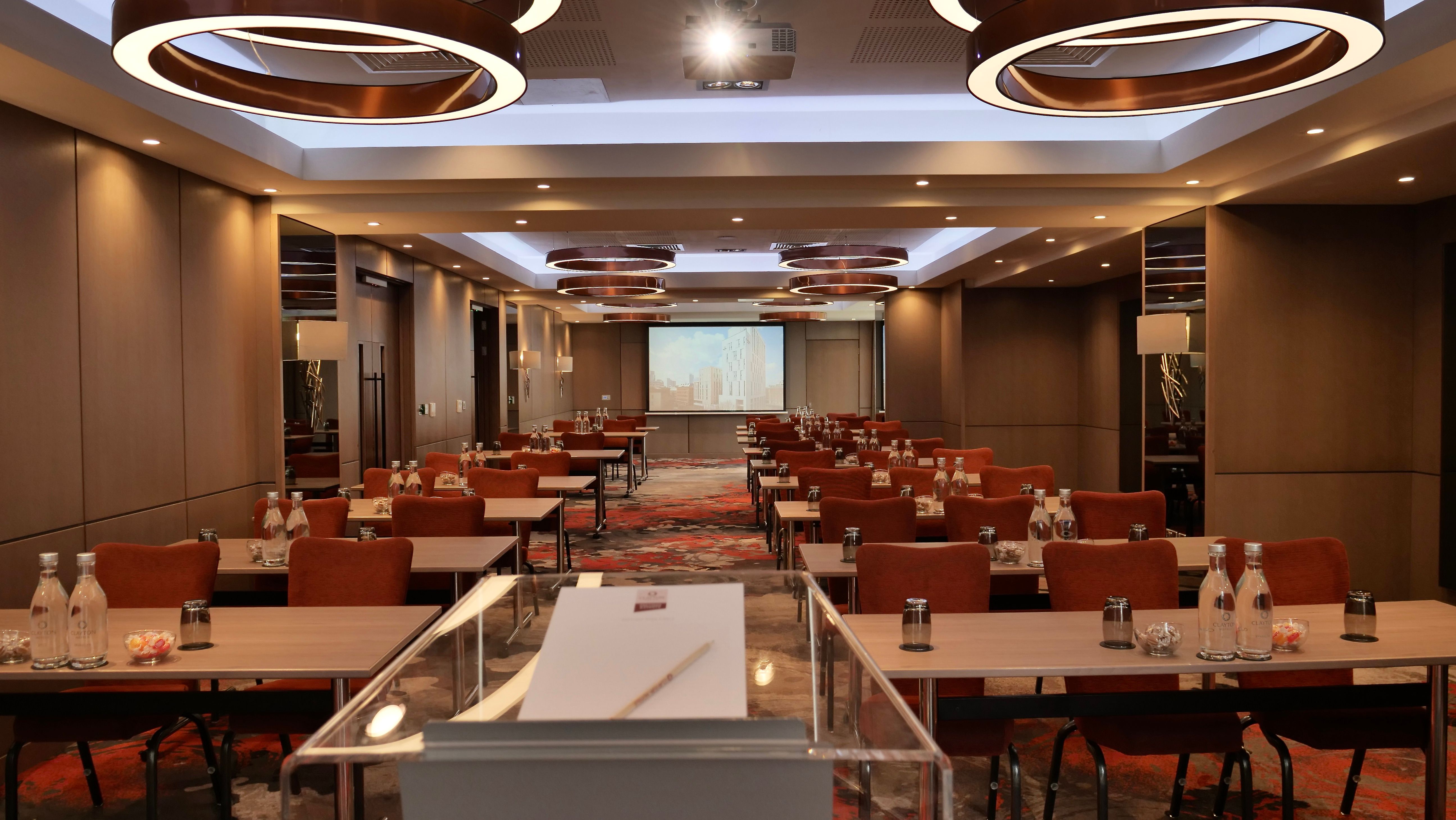 Modern meeting room in Rochdale with natural light, perfect for professional events.