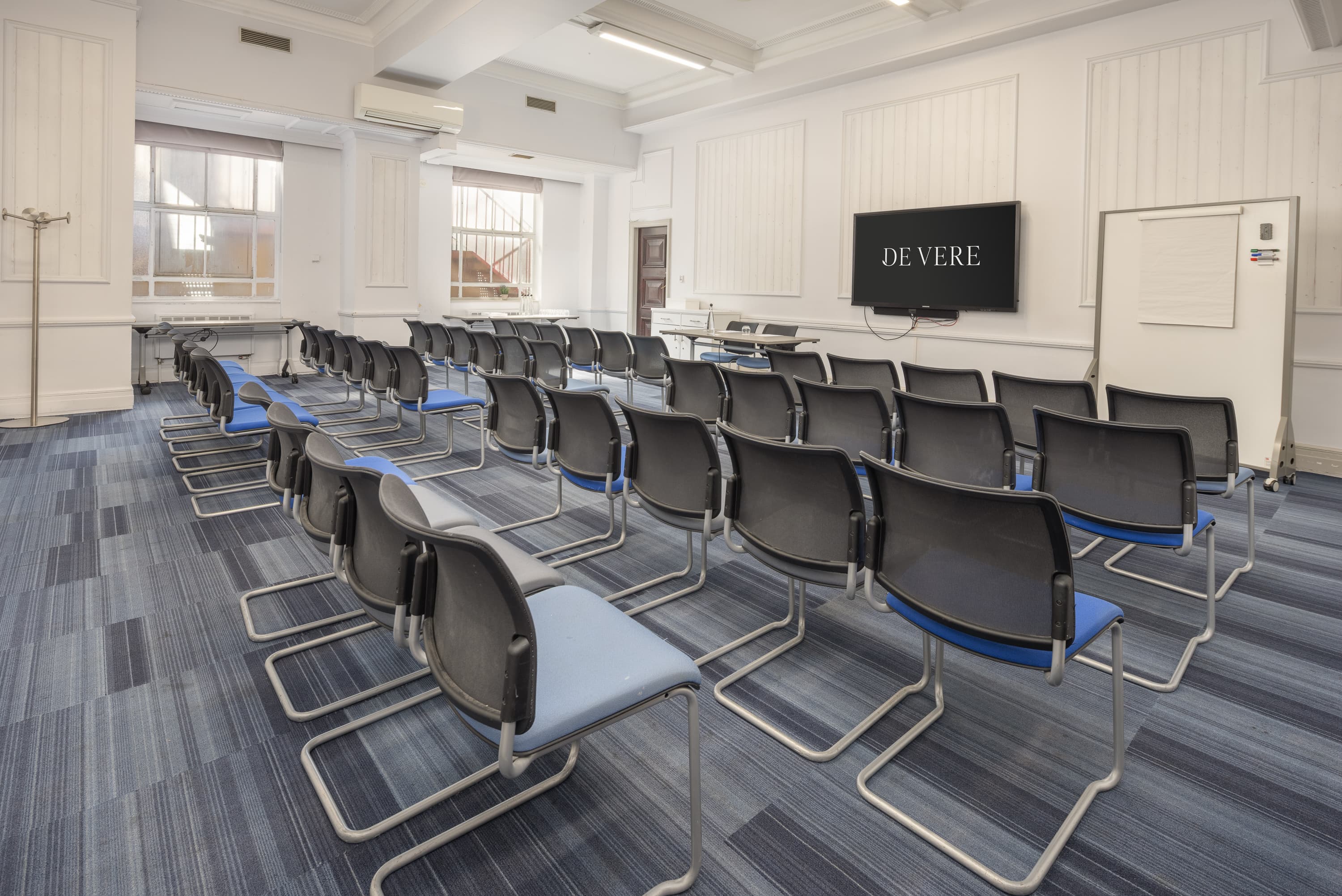 Derby Suite, Grand Connaught Rooms: theater-style meeting room for professional corporate events.