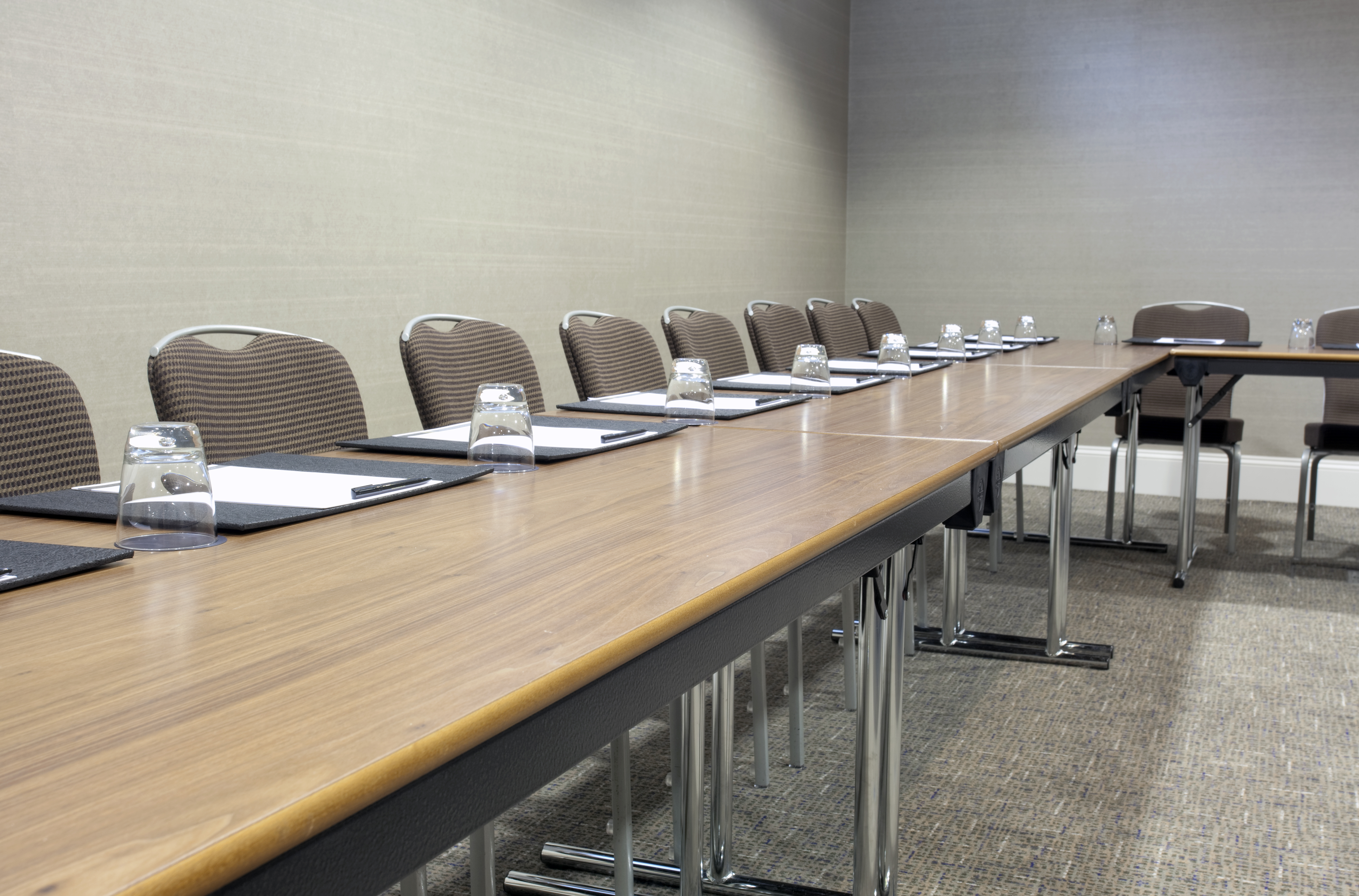 Holborn Suite meeting room with long table, ideal for professional gatherings and events.