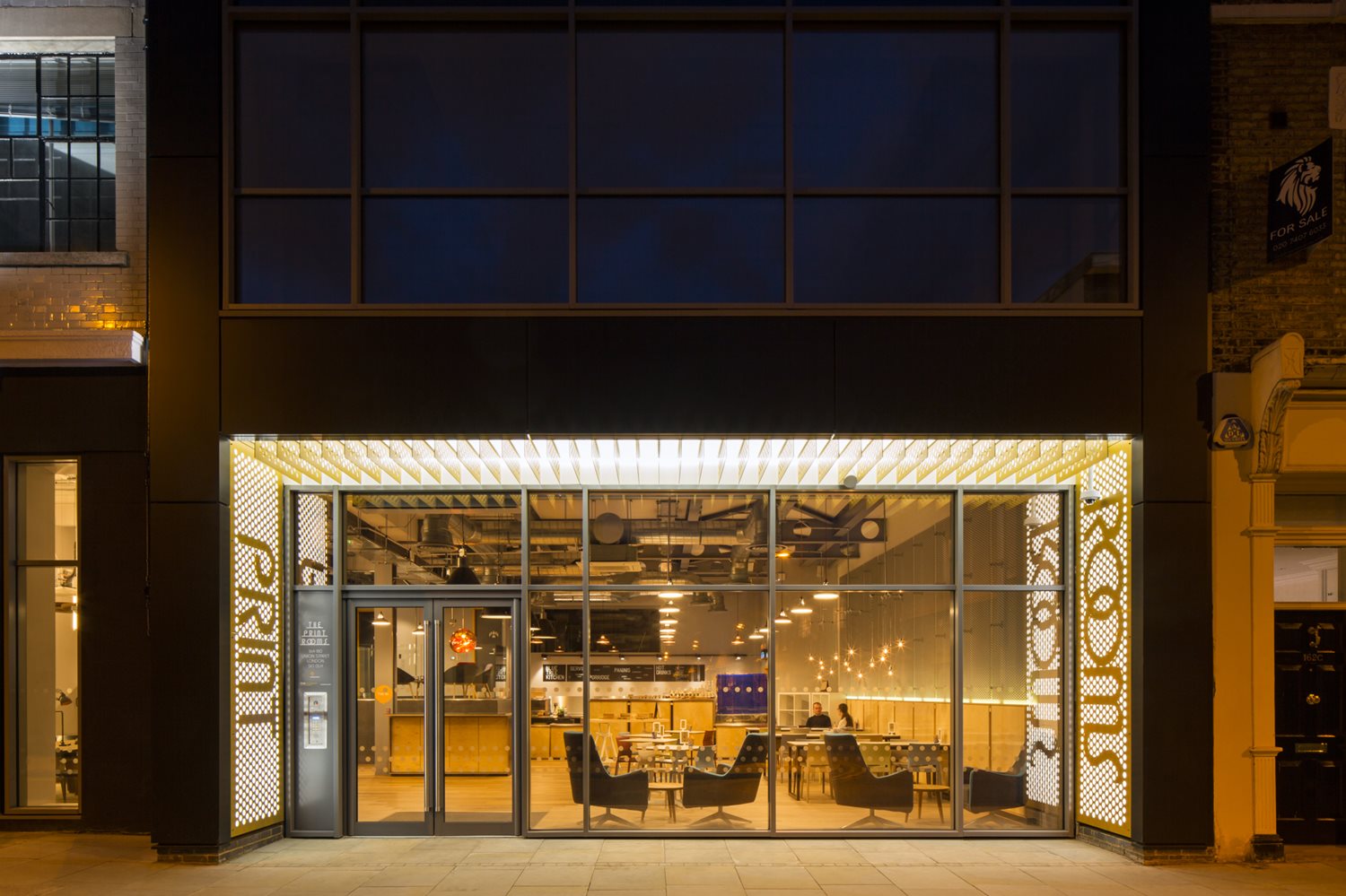 Modern Duplex Studios event space with large glass windows, ideal for meetings and workshops.