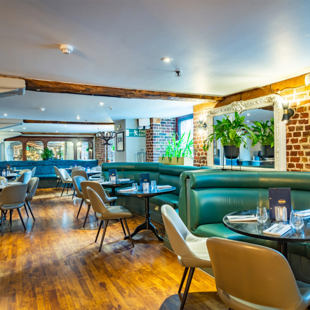 Stylish Cellar Bar terrace with cozy seating, ideal for intimate gatherings and corporate events.