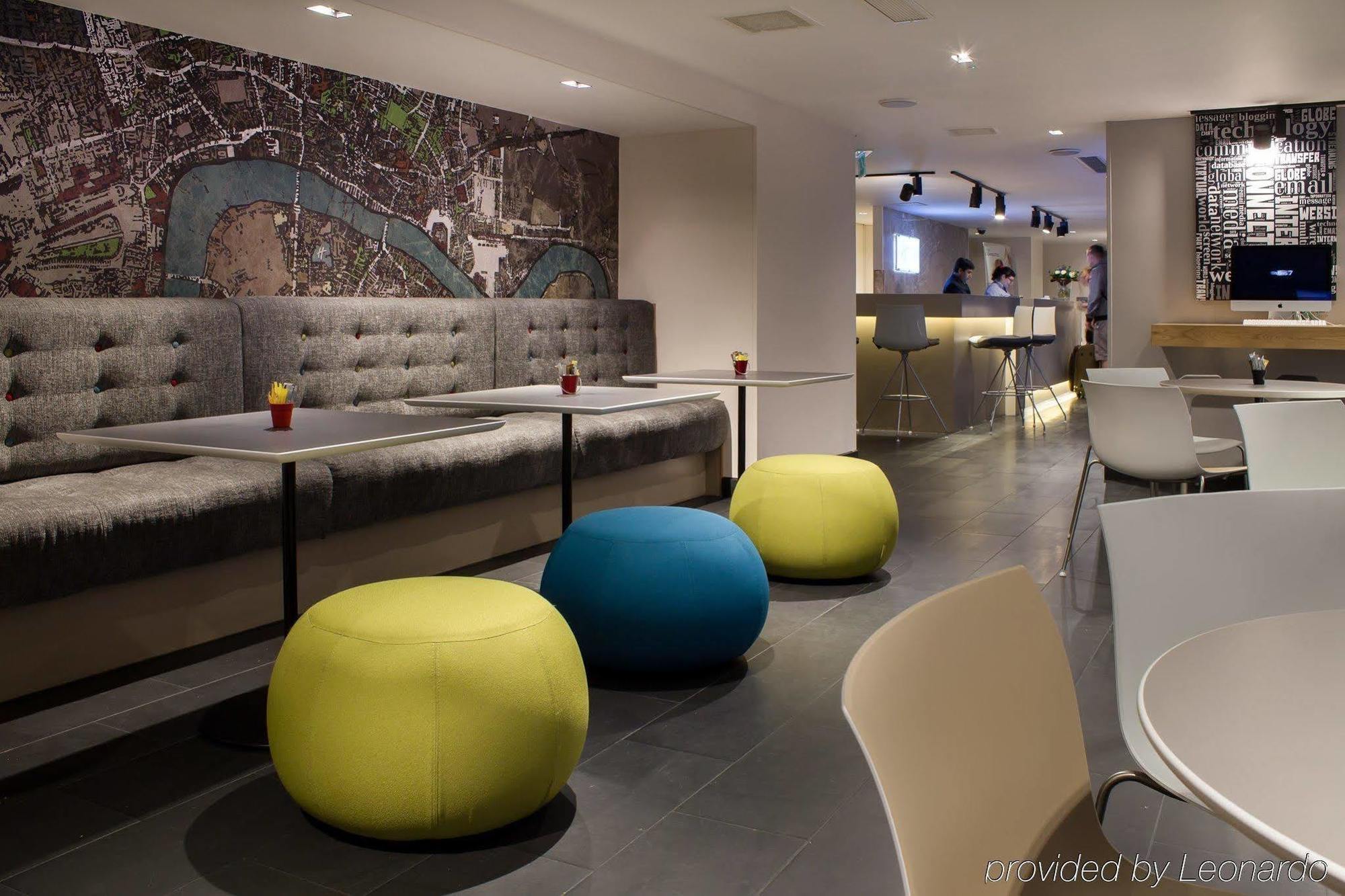 Modern meeting space with vibrant seating at Holiday Inn Express London - Southwark.