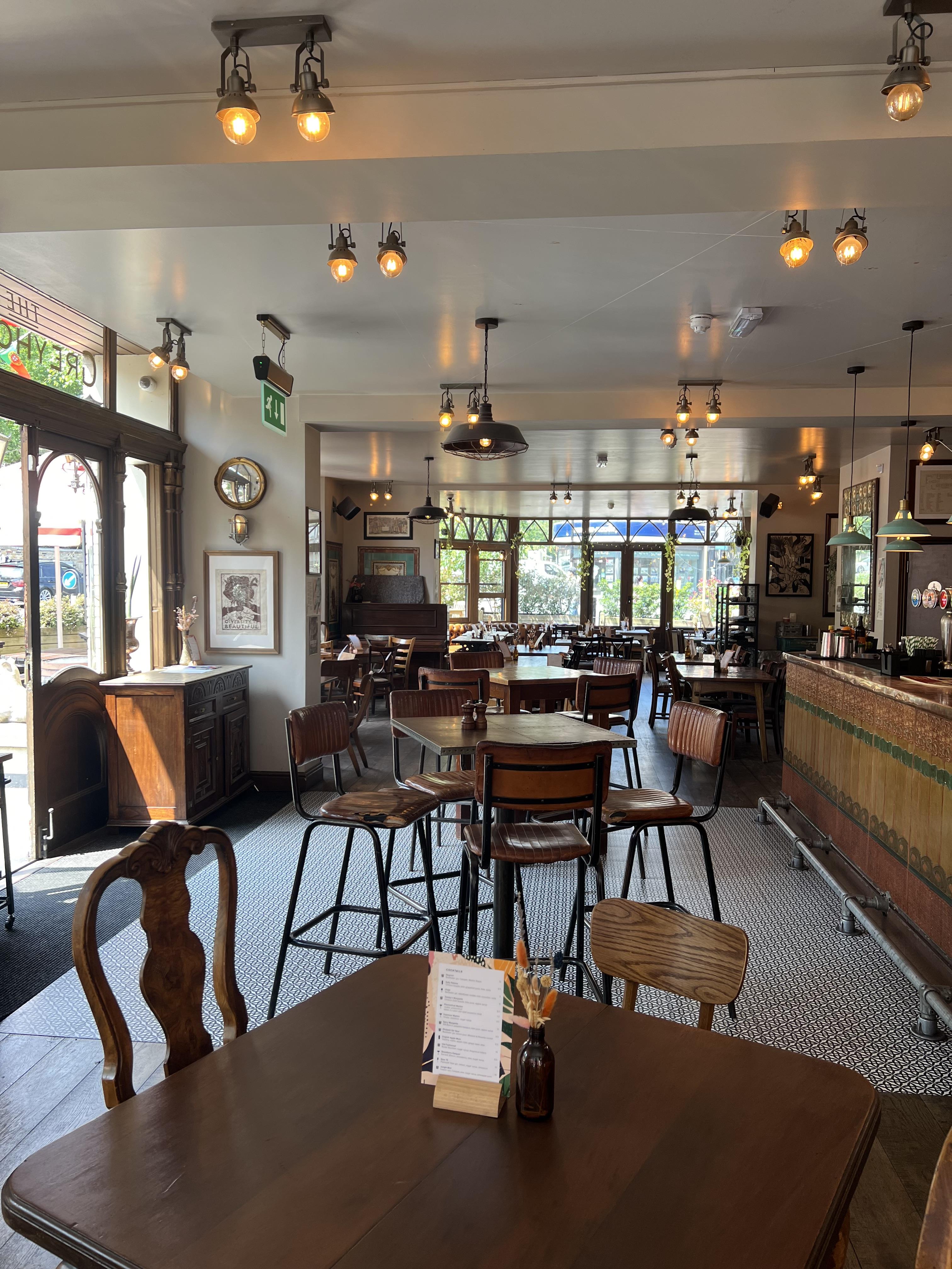 Charming restaurant venue hire with vintage decor for intimate gatherings and meetings.