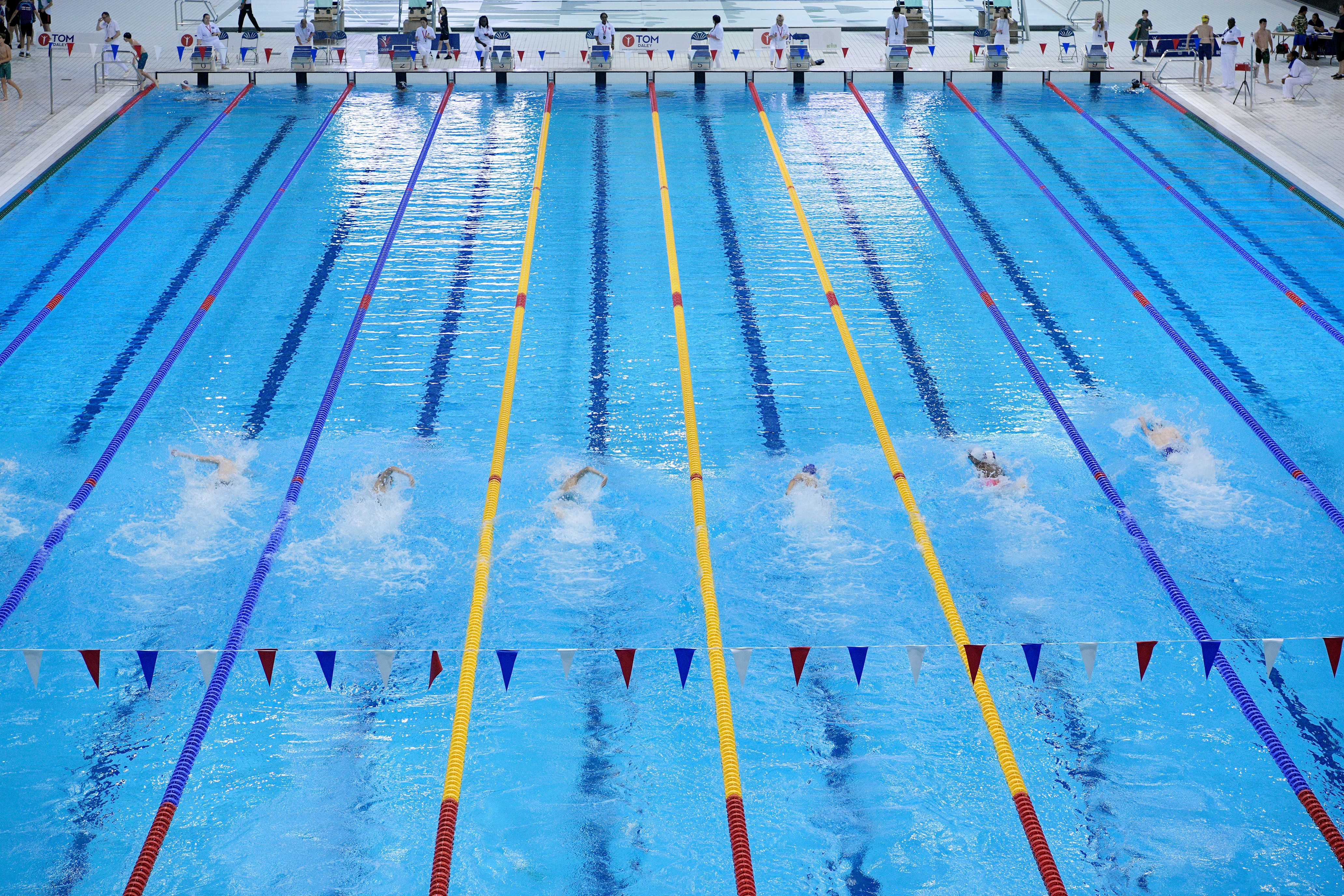 Olympic Pool at London Aquatics Centre, vibrant lanes for competitive swimming events.